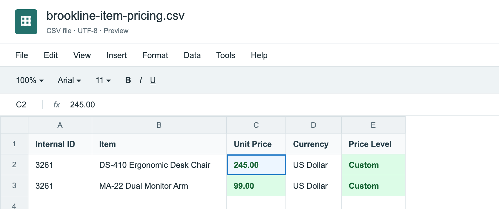 The CSV file brookline-item-pricing.csv with two rows for Internal ID 3261: DS-410 Ergonomic Desk Chair, 245.00, US Dollar, Custom, and MA-22 Dual Monitor Arm, 99.00, US Dollar, Custom.