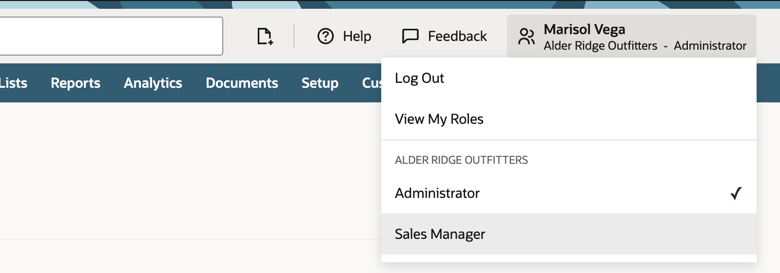 The account menu open under Marisol Vega, Alder Ridge Outfitters, Administrator, listing Log Out, View My Roles, and the roles Administrator (checked) and Sales Manager.