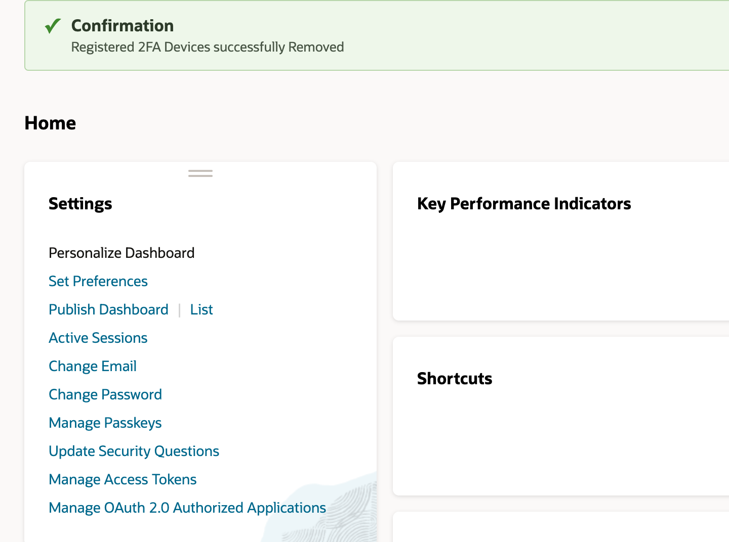 Home with the Confirmation band Registered 2FA Devices successfully Removed. The Settings portlet now goes from Manage Passkeys straight to Update Security Questions, without the two 2FA links.